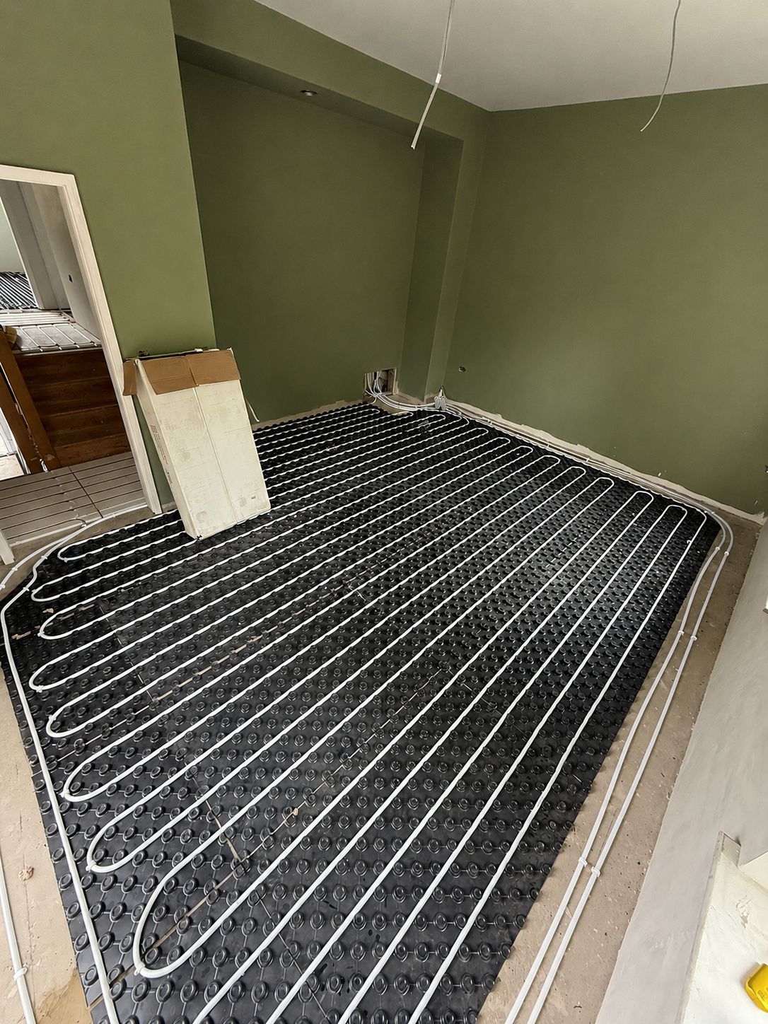 Underfloor heating pipework in a new build across Oxfordshire