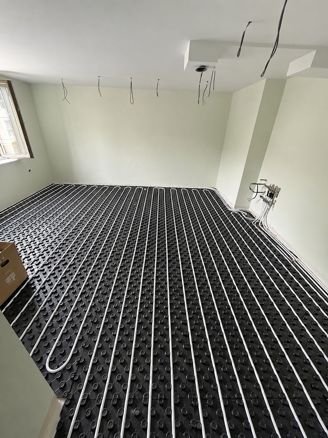 Underfloor heating pipework laid by Pinnacle Plumbing across Oxfordshire