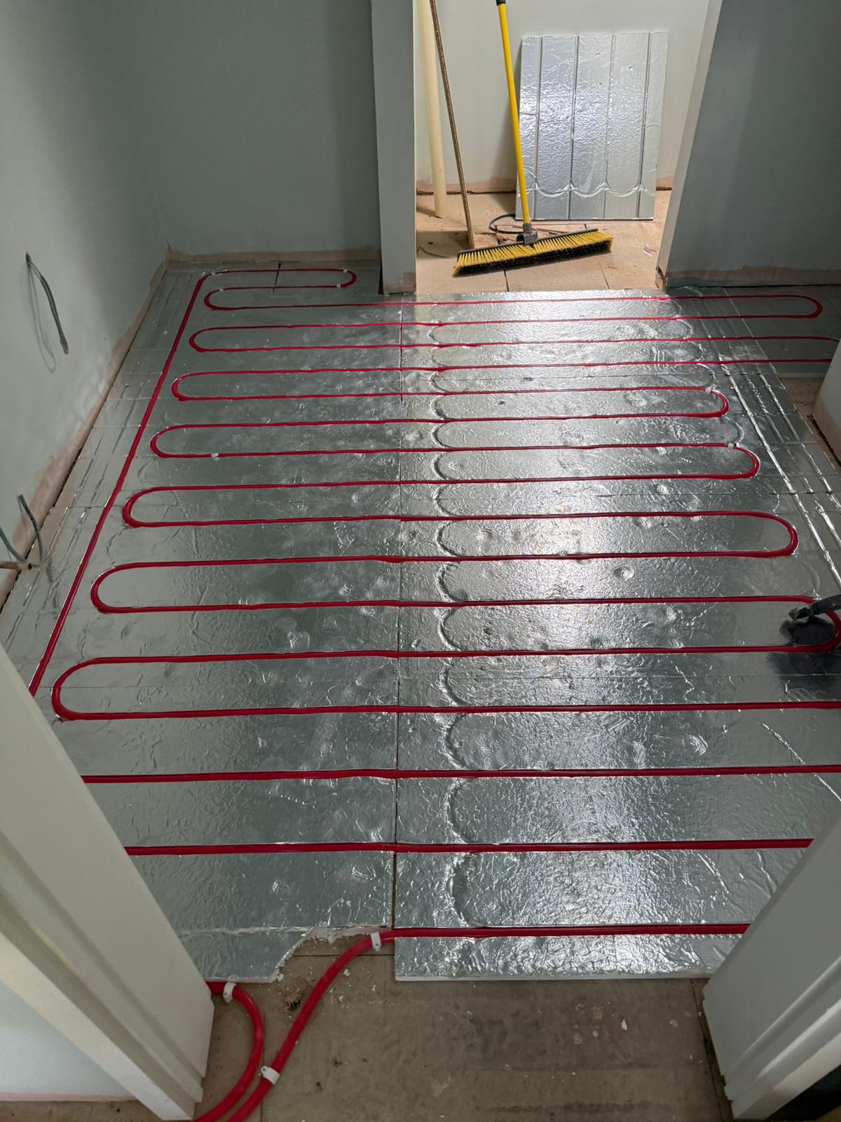 Underfloor heating pipework laid by Pinnacle Plumbing across Oxfordshire