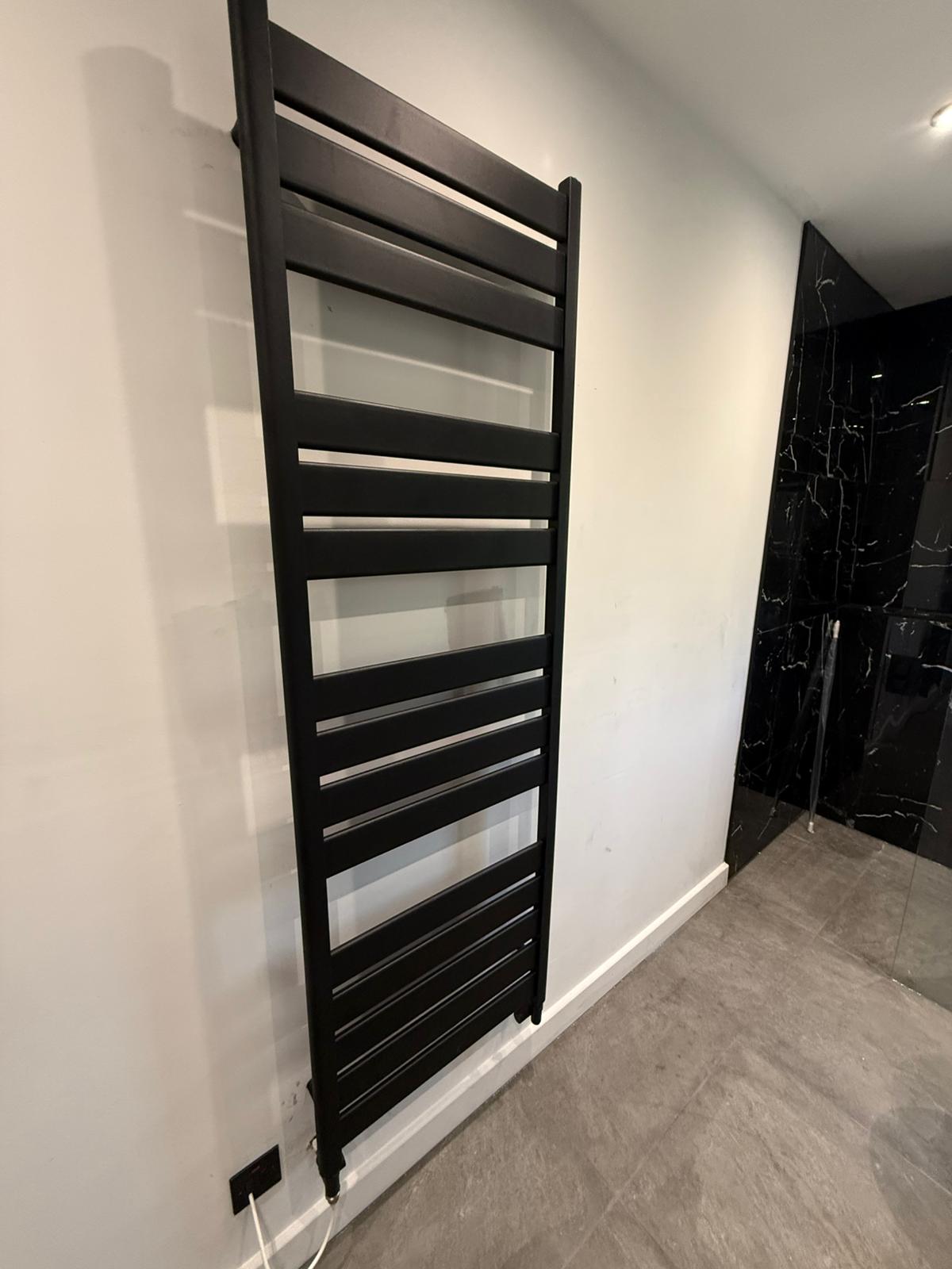 Heated towel rail installation by Pinnacle Plumbing, Oxfordshire