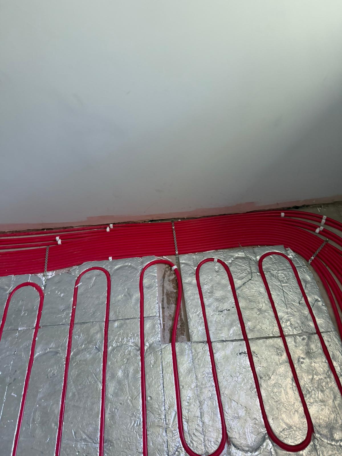 Underfloor heating pipework laid by Pinnacle Plumbing across Oxfordshire